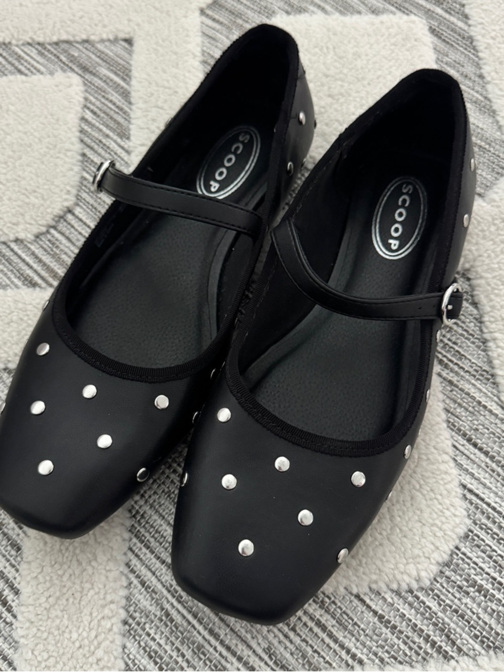 Black studded flats